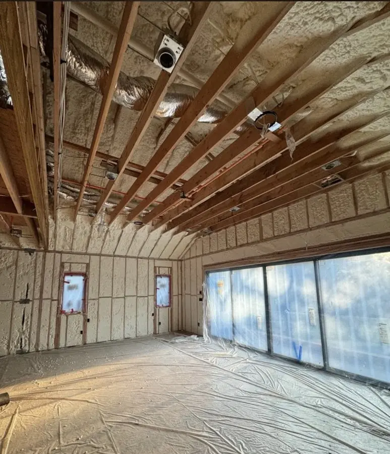 Interior walls and ceiling insulated with spray foam during new construction in North Lynnwood